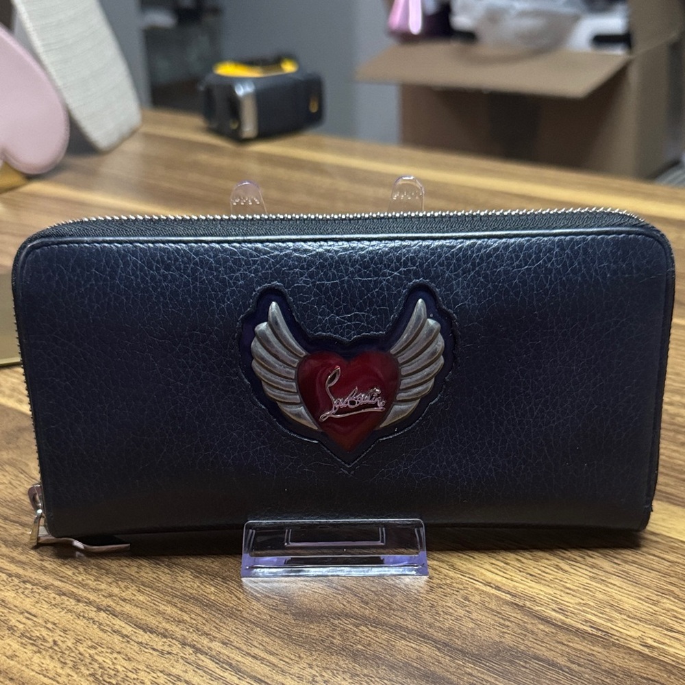 Christian Louboutin Dark Blue Wallet with Red Heart and Silver Wings.